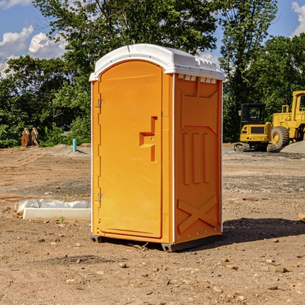 how often are the portable restrooms cleaned and serviced during a rental period in Almena